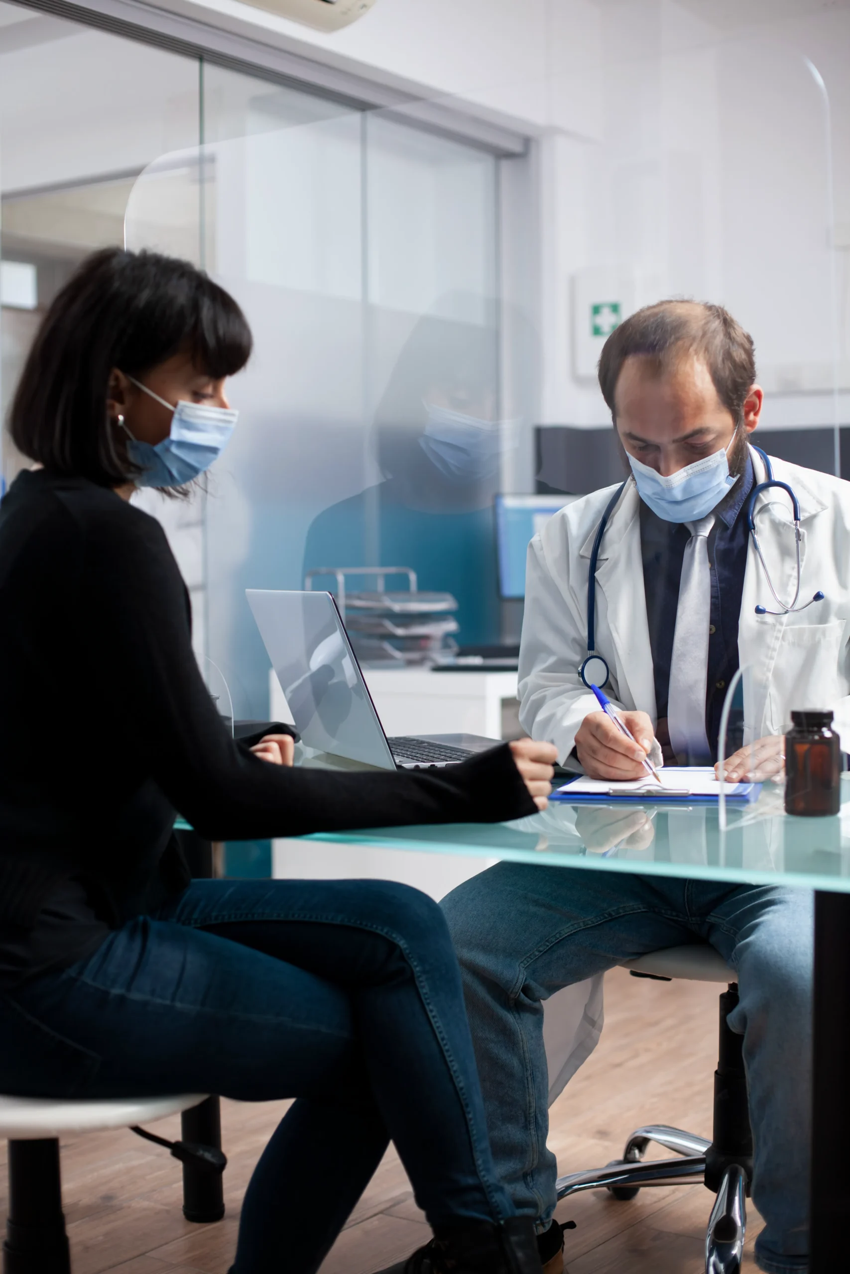 Patient consulting with a primary doctor near me during an in-office consultation.